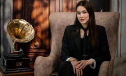 russian women's rights, A woman sitting in a chair in a room